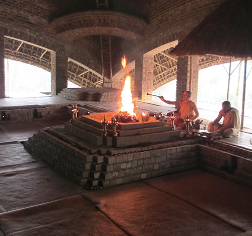 Brahmana teachers at a gurukula in Sridham Mayapura performing a Narasimha-yajna