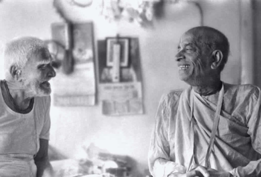 Prabhupada smiles while listening to story
